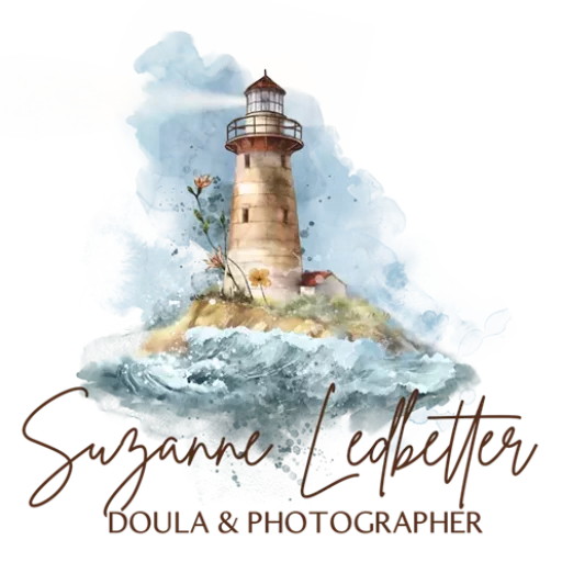 Illustration of a lighthouse on a small, grassy island surrounded by turbulent waves. Pink flowers grow at the base of the lighthouse. The background is a watercolor wash of blue, and the text "Suzanne Ledbetter, Doula & Photographer" appears at the bottom.